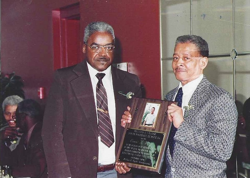 Ernest Webster receiving a commemorative plaque